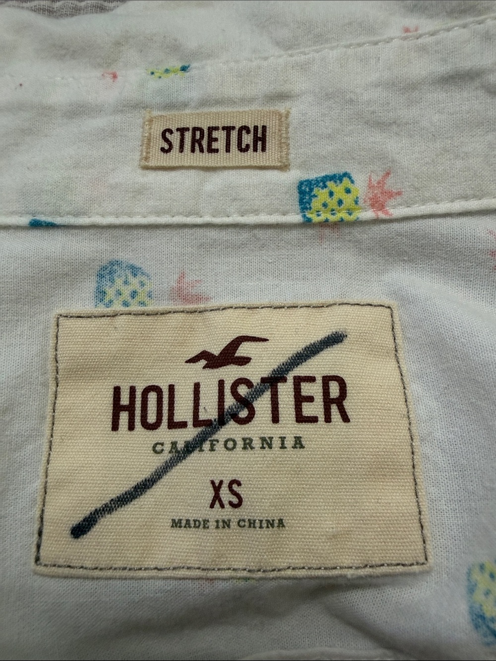 Hollister White Stretch Top with Blue, Yellow and Pink Pineapple Print